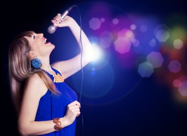 Portrait of young beautiful girl singing clipart