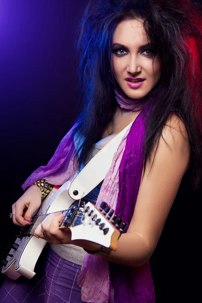 Fashion girl with guitar playing hard rock — Stock Photo, Image