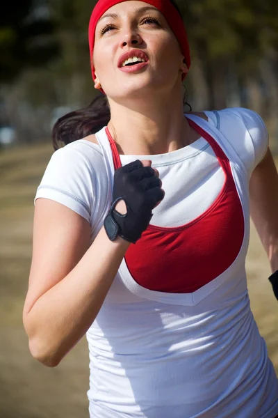 Běží krásná žena — Stock fotografie