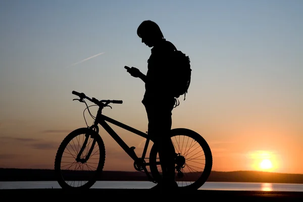 Bicycler call by phone — Stock Photo, Image