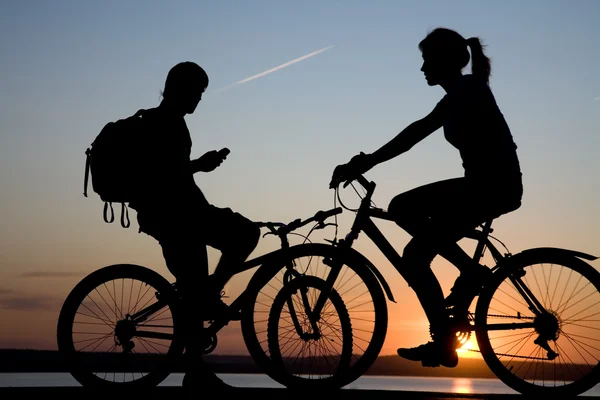 Two bicycler on sunset — Stock Photo, Image