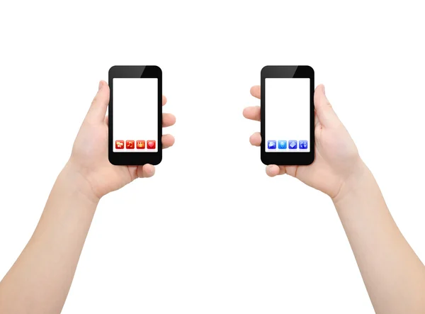 Zwei Hände, die zwei Smartphones halten — Stockfoto