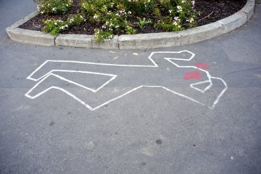 Dead man silhouette drawing on the road clipart