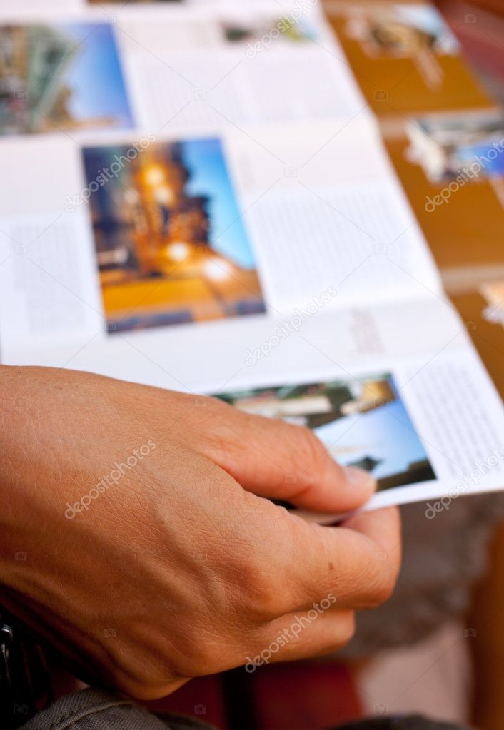 Woman reading a brochure