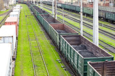 Goods wagons with coal dust clipart