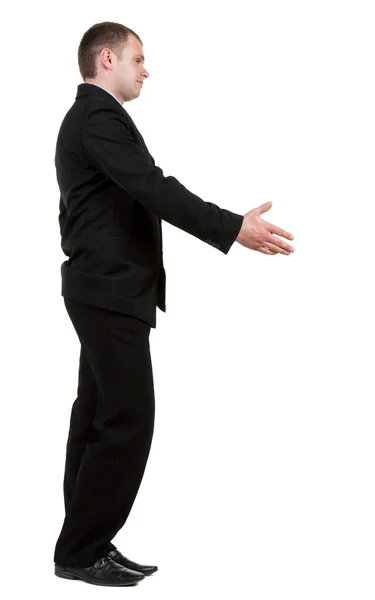 Zijaanzicht van zakenman in handshake zwart pak. — Stockfoto