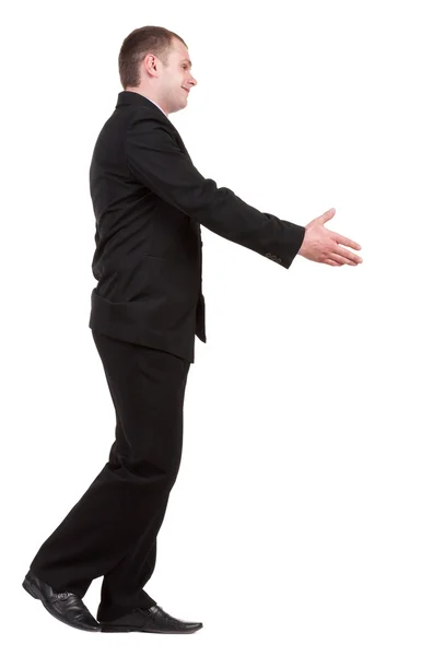 Megy a fekete öltöny kézfogás üzletember. — Stock Fotó