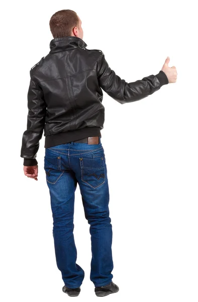 Back view of man shows thumbs up. — Stock Photo, Image