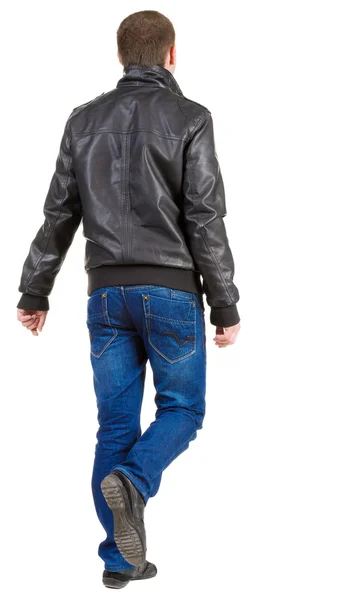 Back view of walking handsome man in jacket. — Stock Photo, Image