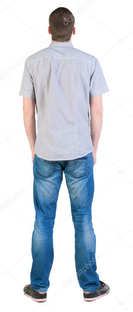 Back view of young men in shirt and jeans.