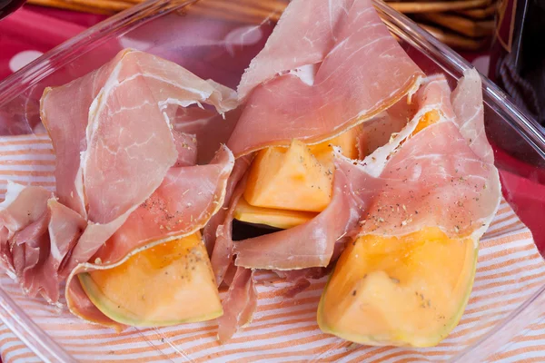 Cantaloupe melon with italian ham — Stock Photo, Image