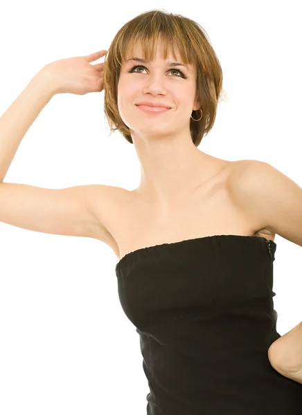 Молодая смеющаяся женщина в черном платье — стоковое фото