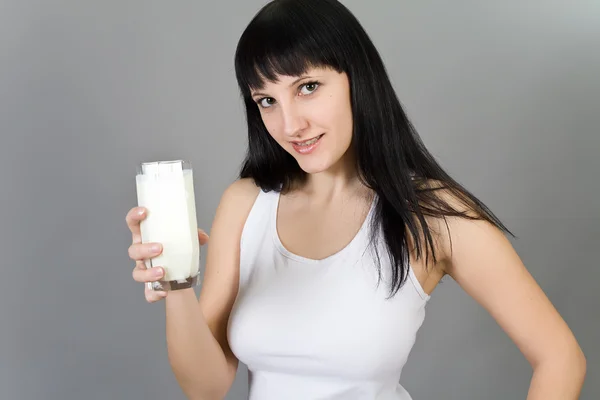 Girl in a white vest — Stock Photo, Image