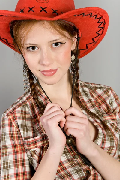 Girl in a checkered shirt — Stock Photo, Image