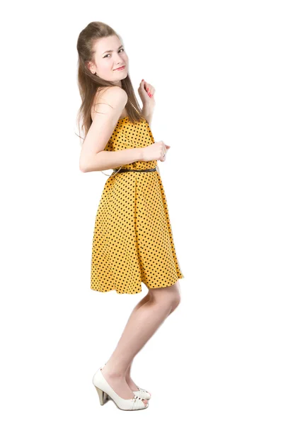 Girl in a yellow dress — Stock Photo, Image