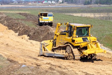 Bulldozer and truck work clipart