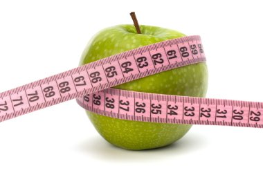 Apple with tape measure. Healthy lifestyle concept. clipart