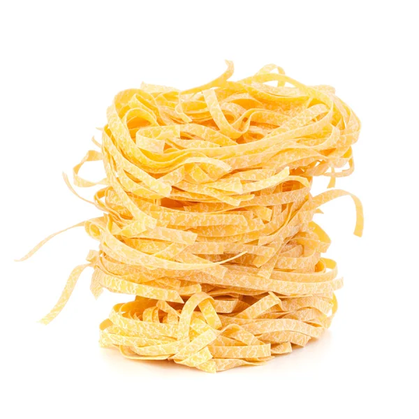 Italian pasta tagliatelle nest isolated on white background — Stock Photo, Image