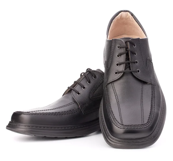 Black glossy man 's shoes with shoelaces — стоковое фото