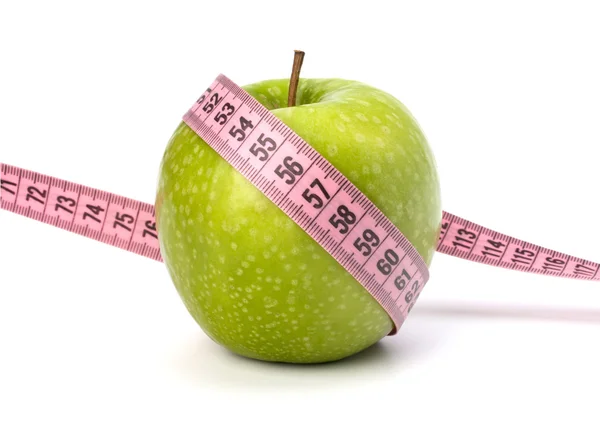 Manzana con cinta métrica. concepto de estilo de vida saludable . Imagen De Stock