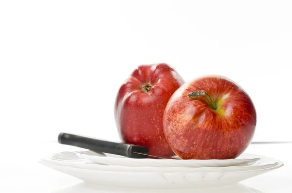 Apple jídlo přes bílý — Stock fotografie
