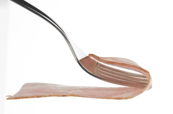 Pancetta cruda sulla forchetta — Foto Stock