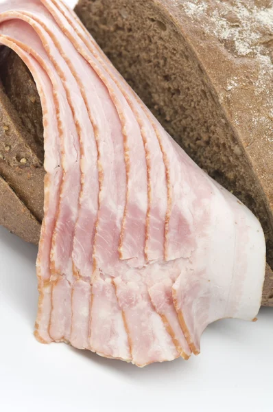 Bacon cru com pão — Fotografia de Stock