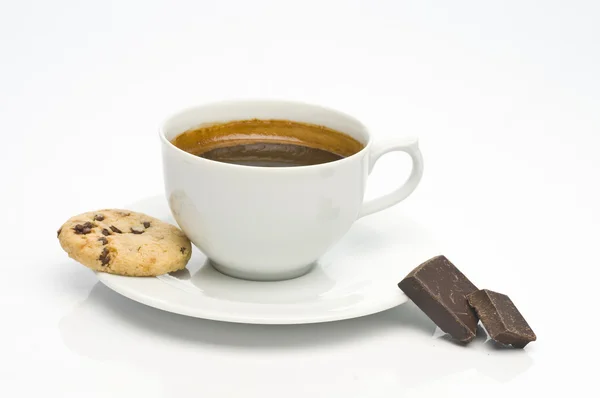 Oatmeal cookie, coffee cup and chocolate — Stock Photo, Image