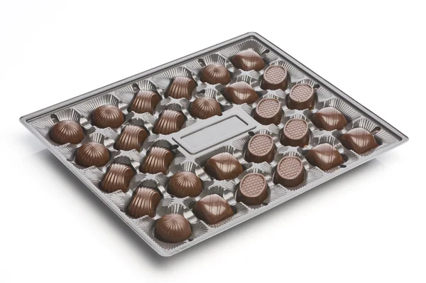 Verschiedene Schokoladenbonbons in einer Schachtel — Stockfoto