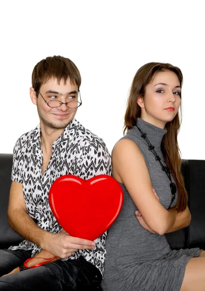 Legrační blbeček chlap dává valentine okouzlující dívka Stock Snímky