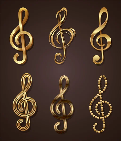 Vector set of golden decorative treble clef — Stock Vector