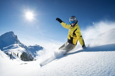 Skier in high mountains