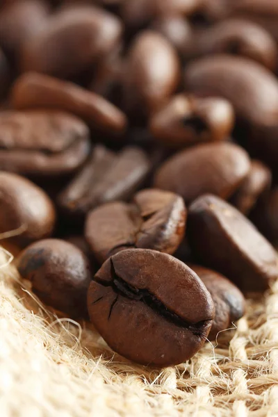 stock image Coffee beans on a burlap sack