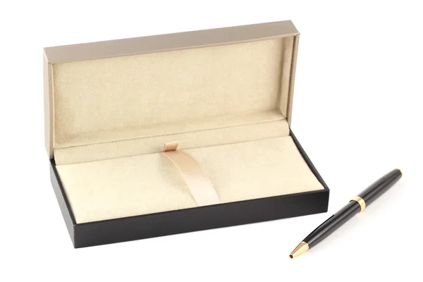 Una pluma en una caja de regalo — Foto de Stock