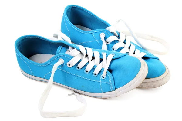 Blå sneaker på en vit bakgrund — Stockfoto