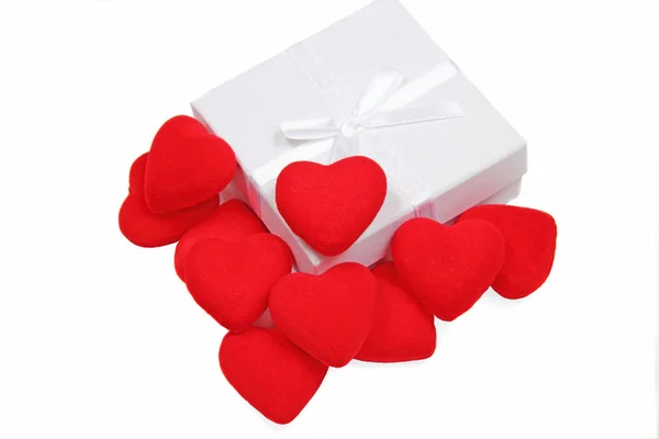 White gift box with red hearts inside on white background — Stock Photo, Image