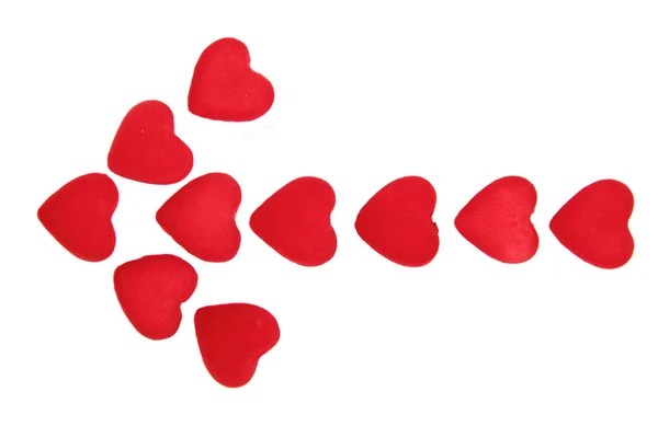 Arrow from the red hearts isolated on white — Stock Photo, Image