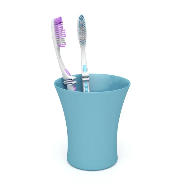 Escovas de dentes em uma xícara — Fotografia de Stock