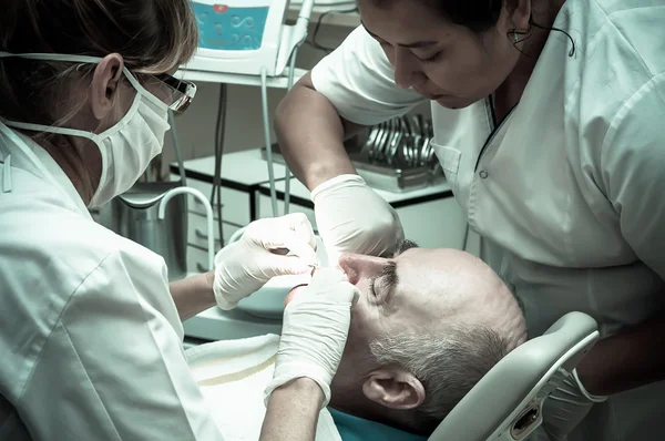 Older man in dentist — Stock Photo, Image
