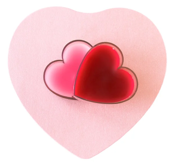 Paar Herzen auf rosa Papier — Stockfoto