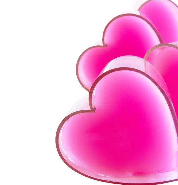 Rad med rosa hjärtan på vit — Stockfoto