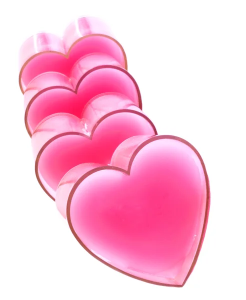 Vertical row of pink hearts — Stock Photo © Evgeni #9689868