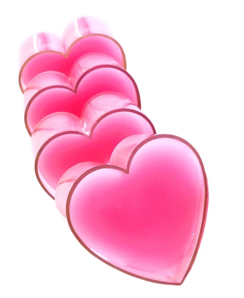 Lodrät rad med rosa hjärtan — Stockfoto