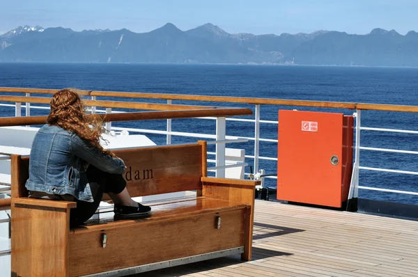 stock image Girl watches off deck of cruise ship