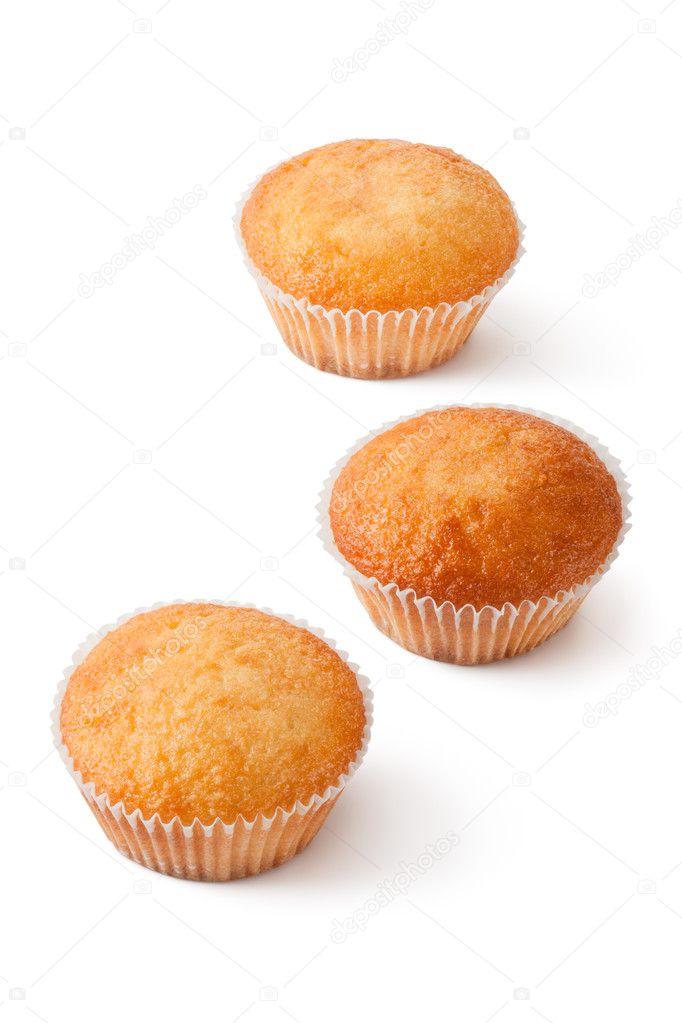 Three mini cupcakes in paper bakeware