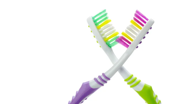 Två färg tandborstar — Stockfoto