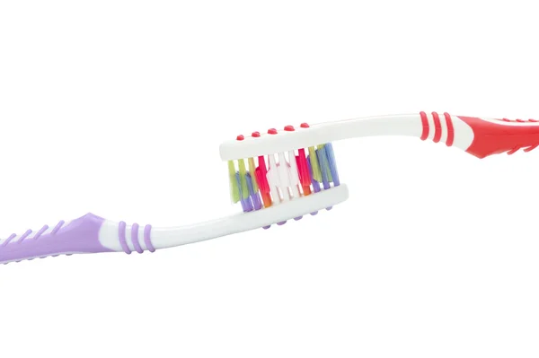 Twee kleur tandenborstels — Stockfoto