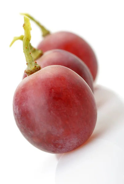 Trzy jagody z czerwonych winogron kluska — Zdjęcie stockowe