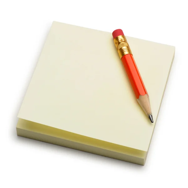 Papper märka och en röd penna — Stockfoto
