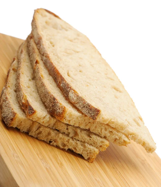 Řez chleba na prkýnko — Stock fotografie